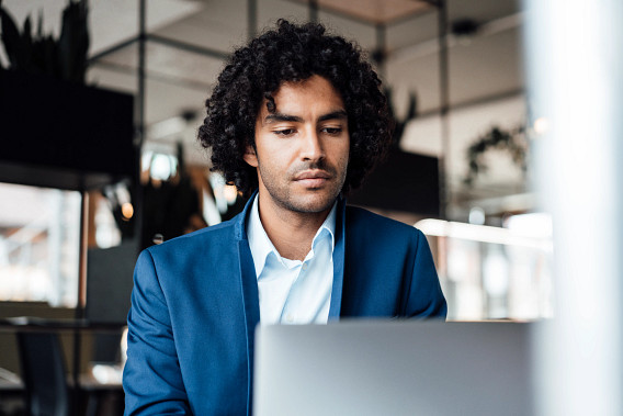 Man studying on laptop
