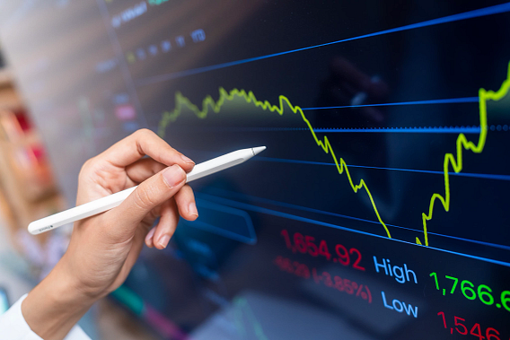 Apple pencil pointing to a graph